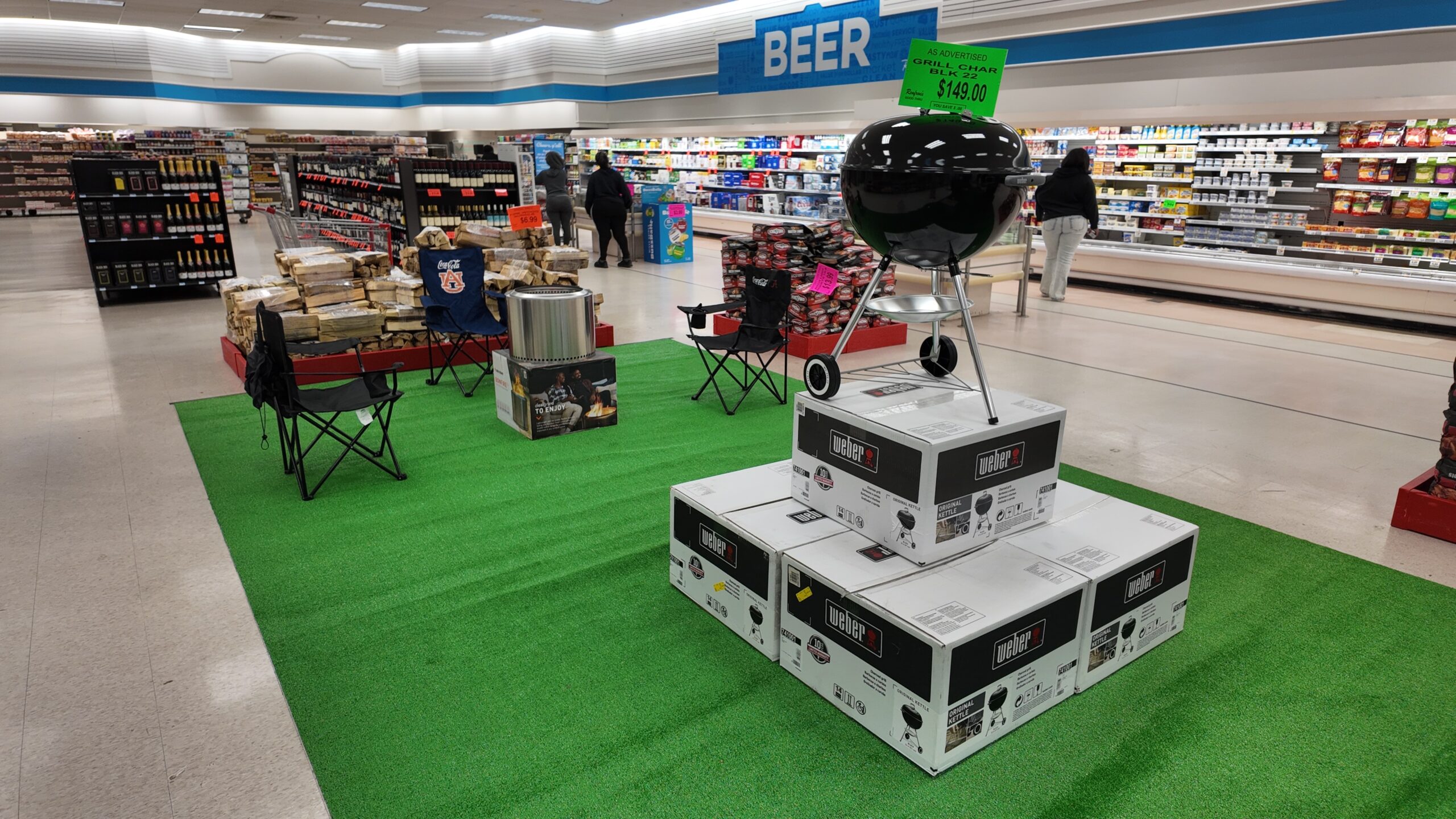 Weber Original Kettle grill and camp chairs display
